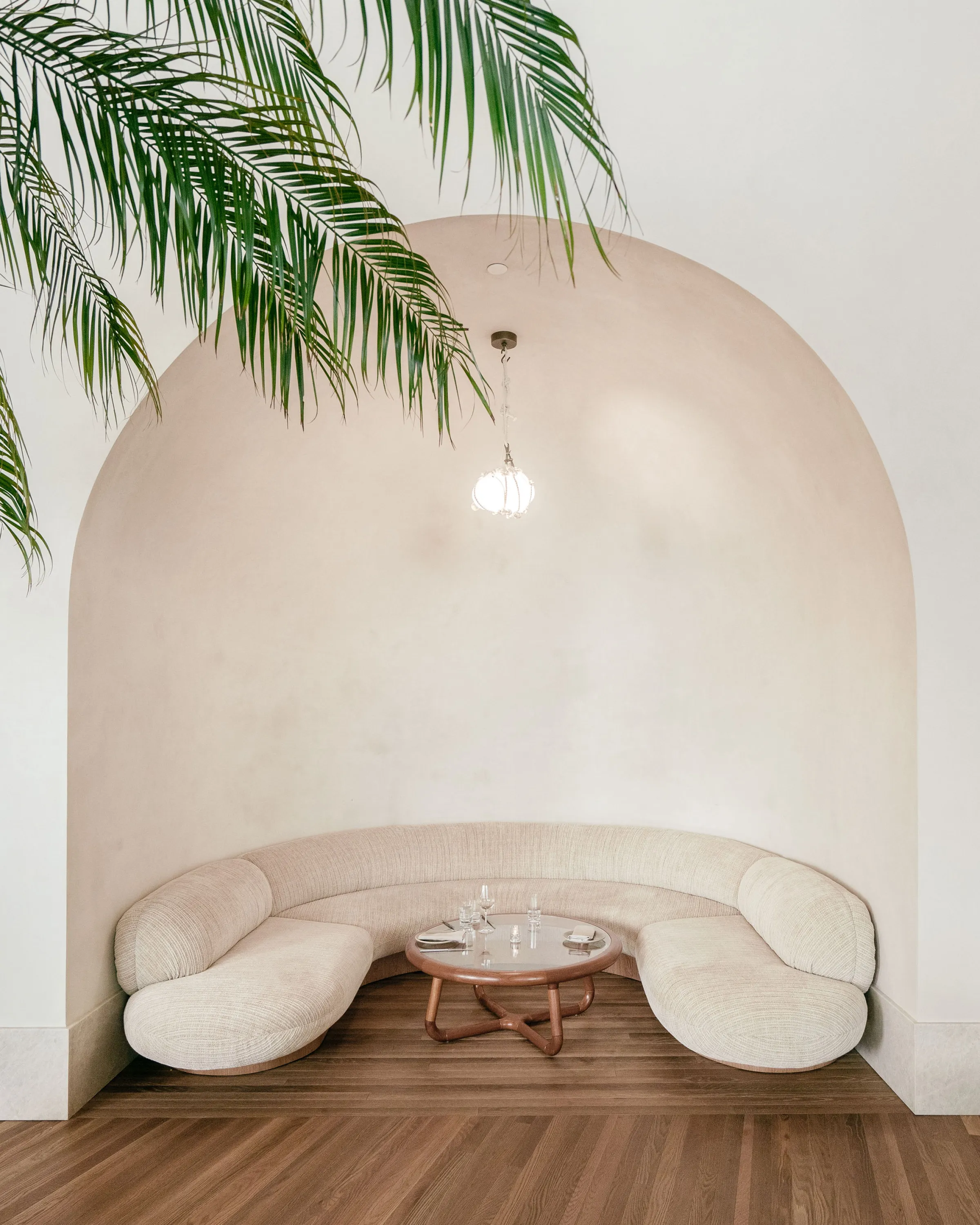 Seating area designed inside a nook for privacy.