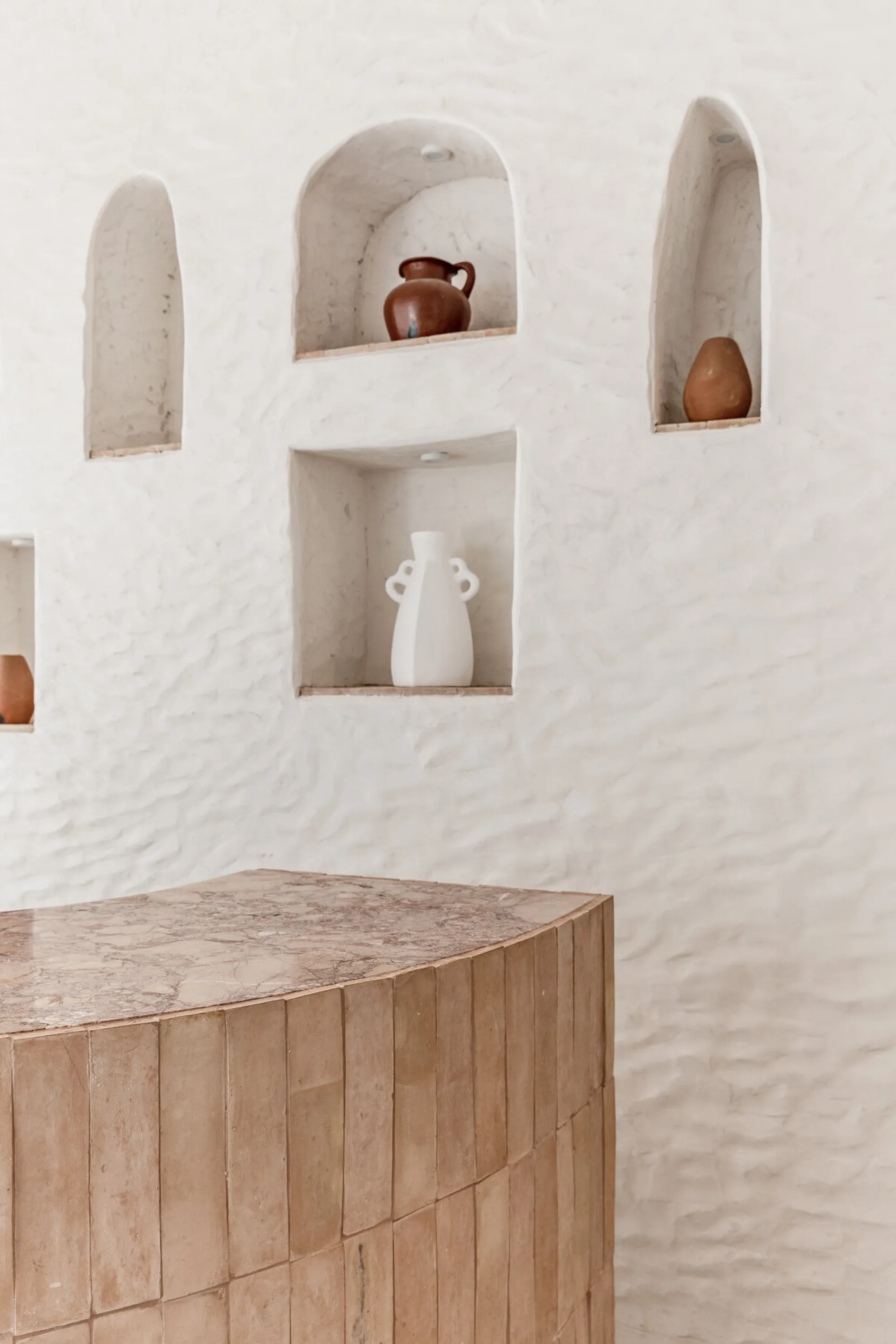 Mediterranean colours and shapes in a reception desk area.