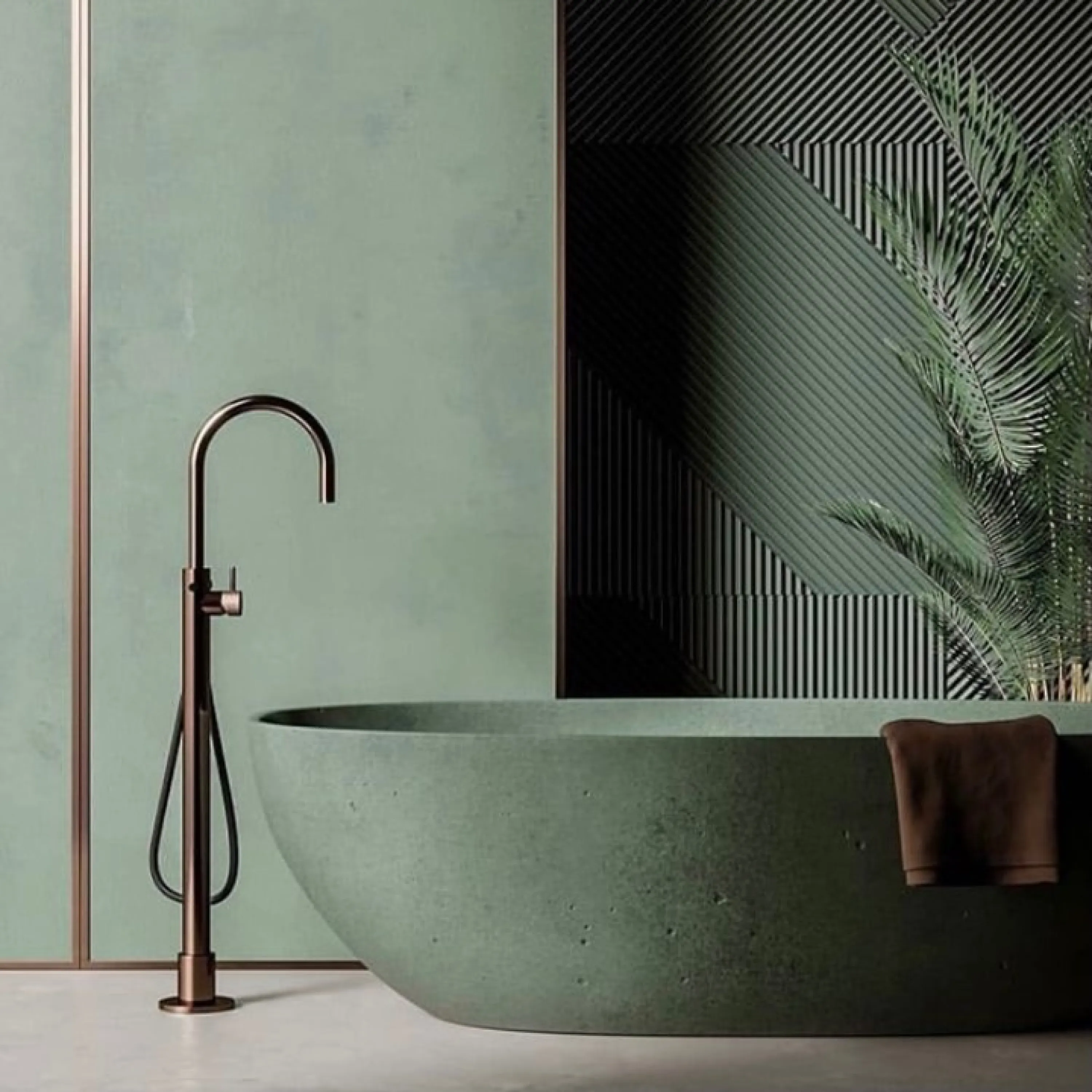 Bathroom with green bathtub and walls and brown fixtures.