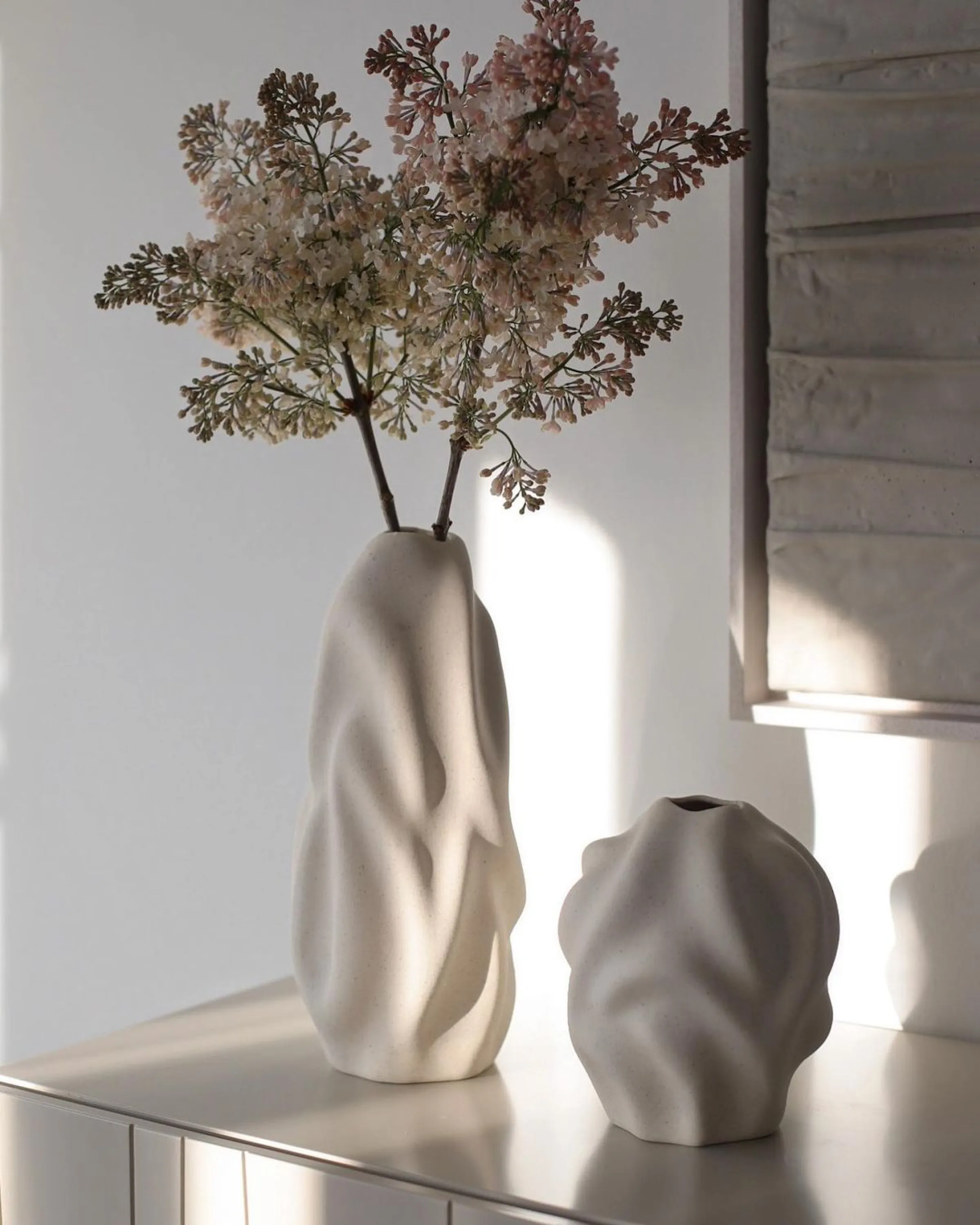 Textures vases with flowers.