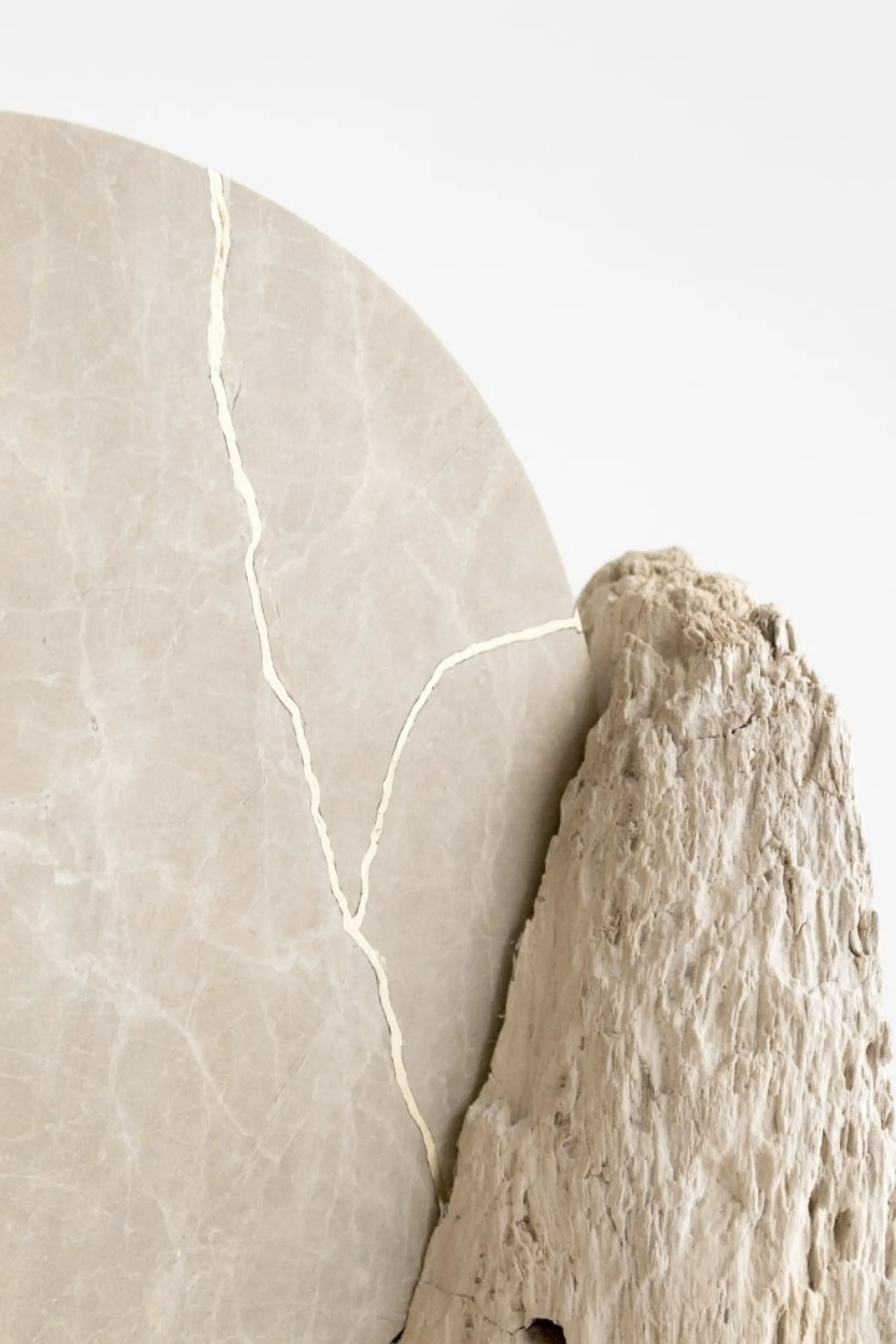 Stone sculpture with varying textures.