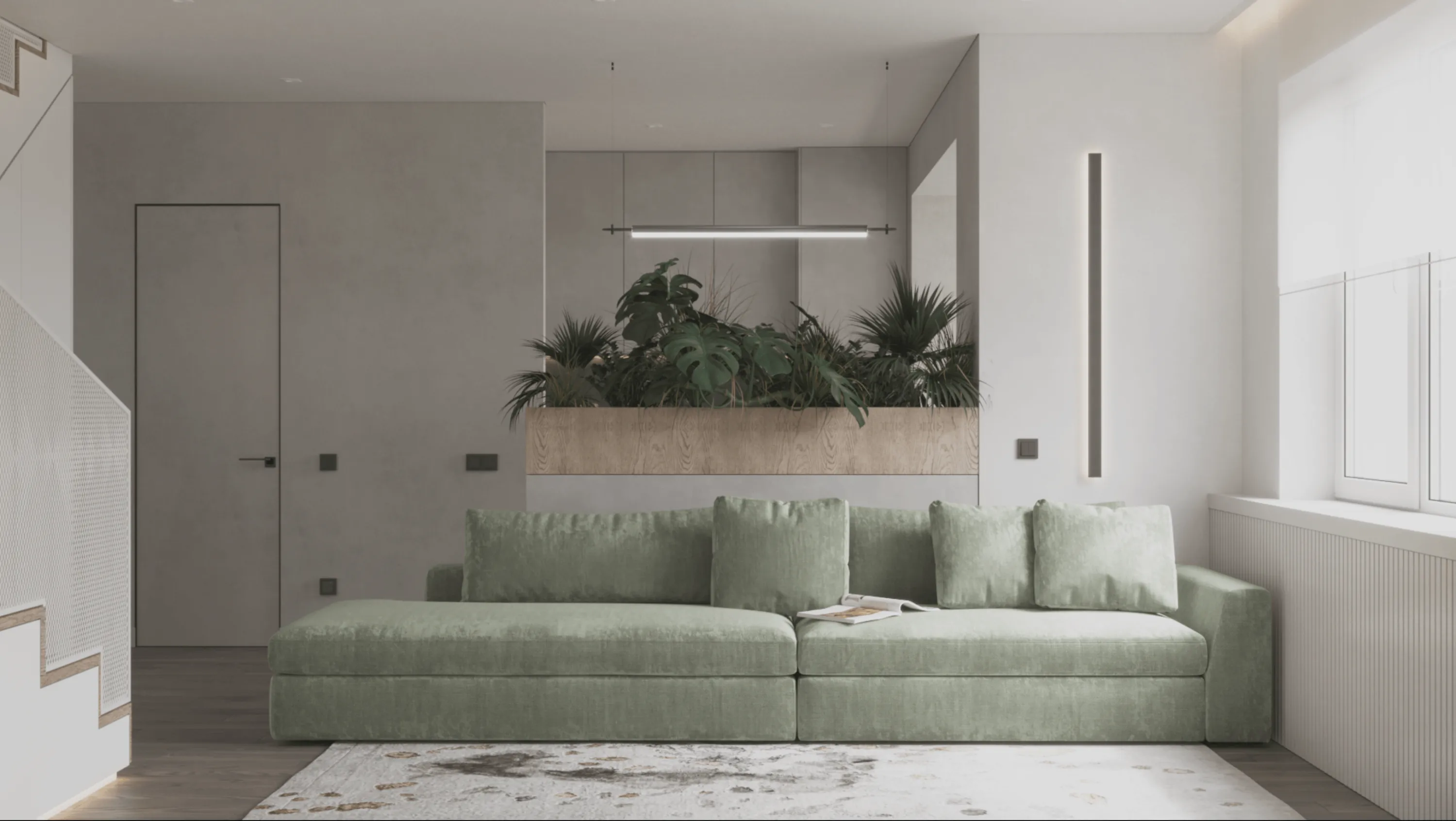 Simple planter used to partition the space in a small apartment.