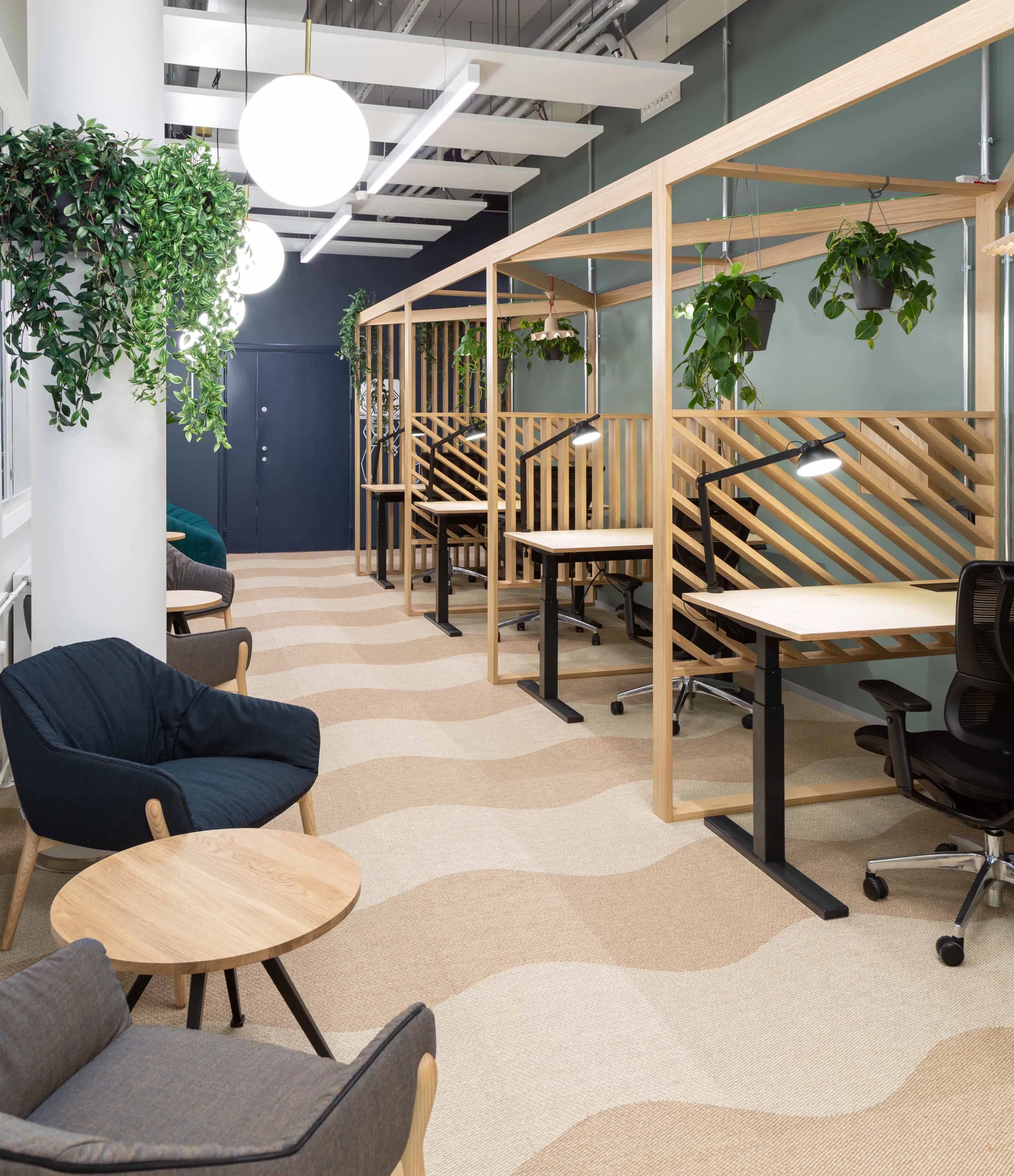 Individual workstations separated with wall panels.
