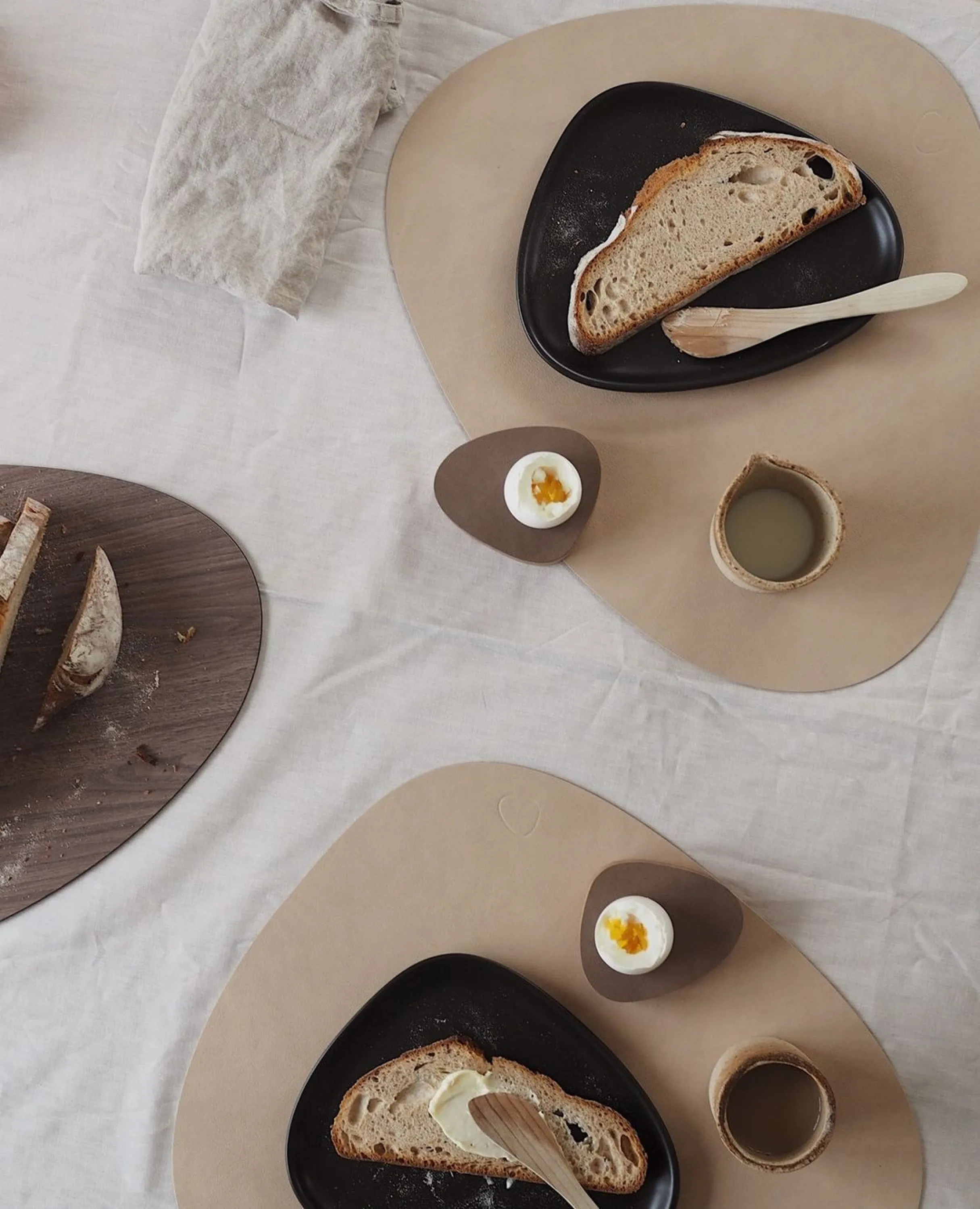 Sustainable placemats styled on a flatlay.