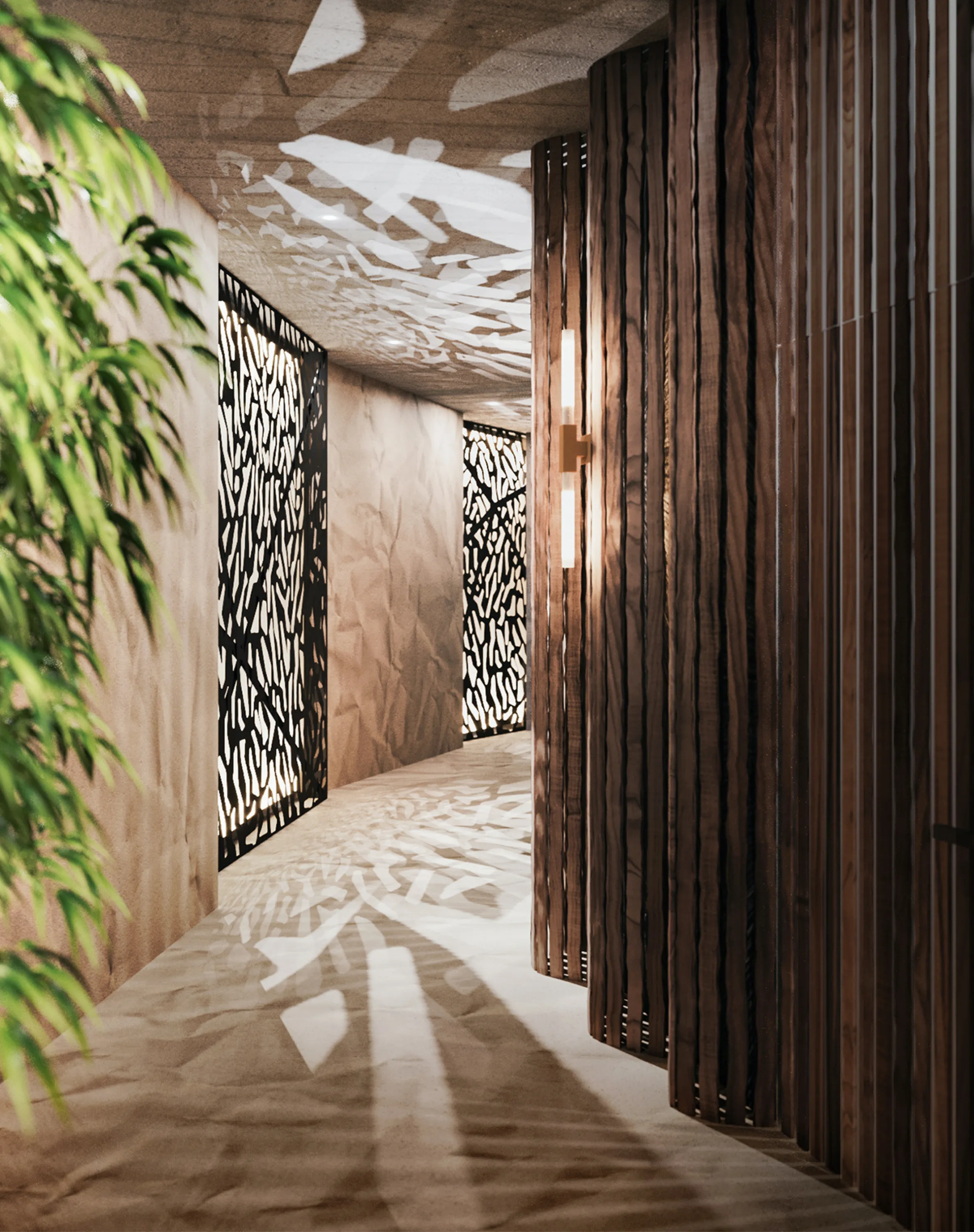 Curved corridor with light reflections drawing shapes on floor and ceiling.