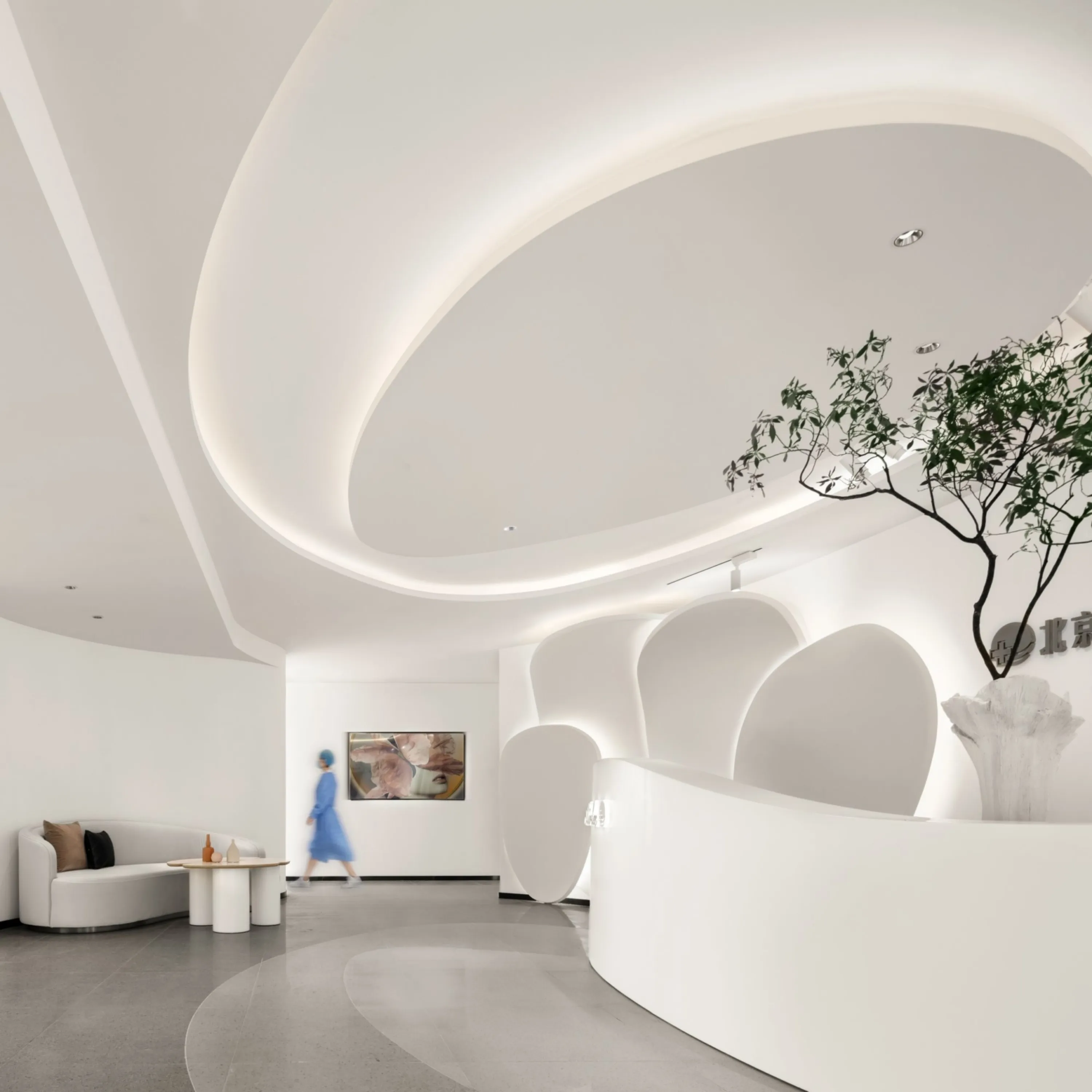 Hospital reception area with sculptural rounded shapes.