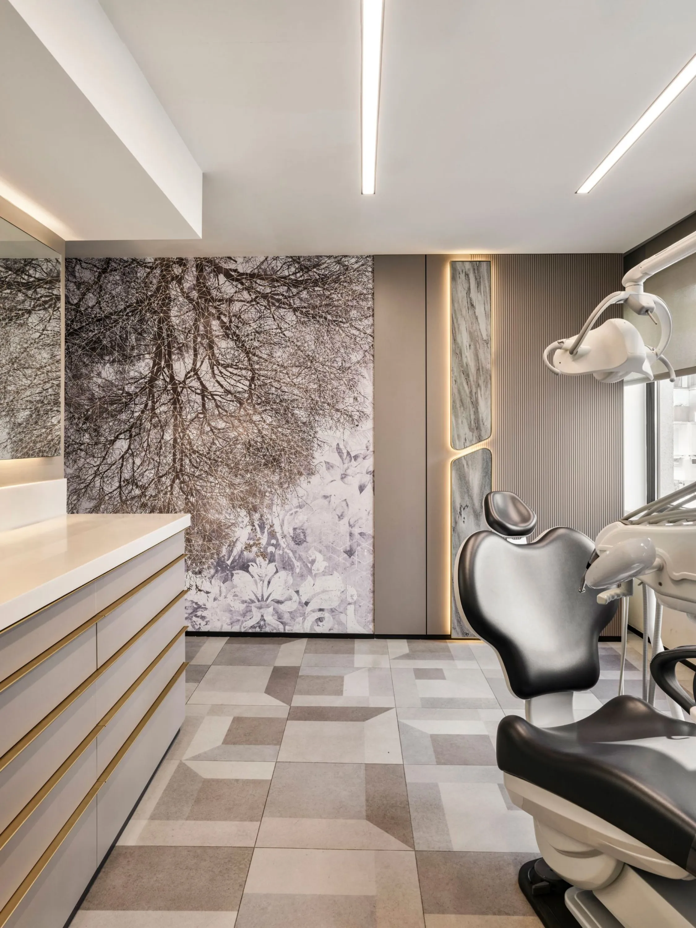 Treatment room with botanical wallpaper, interesting finishes and an earthy colour palette.