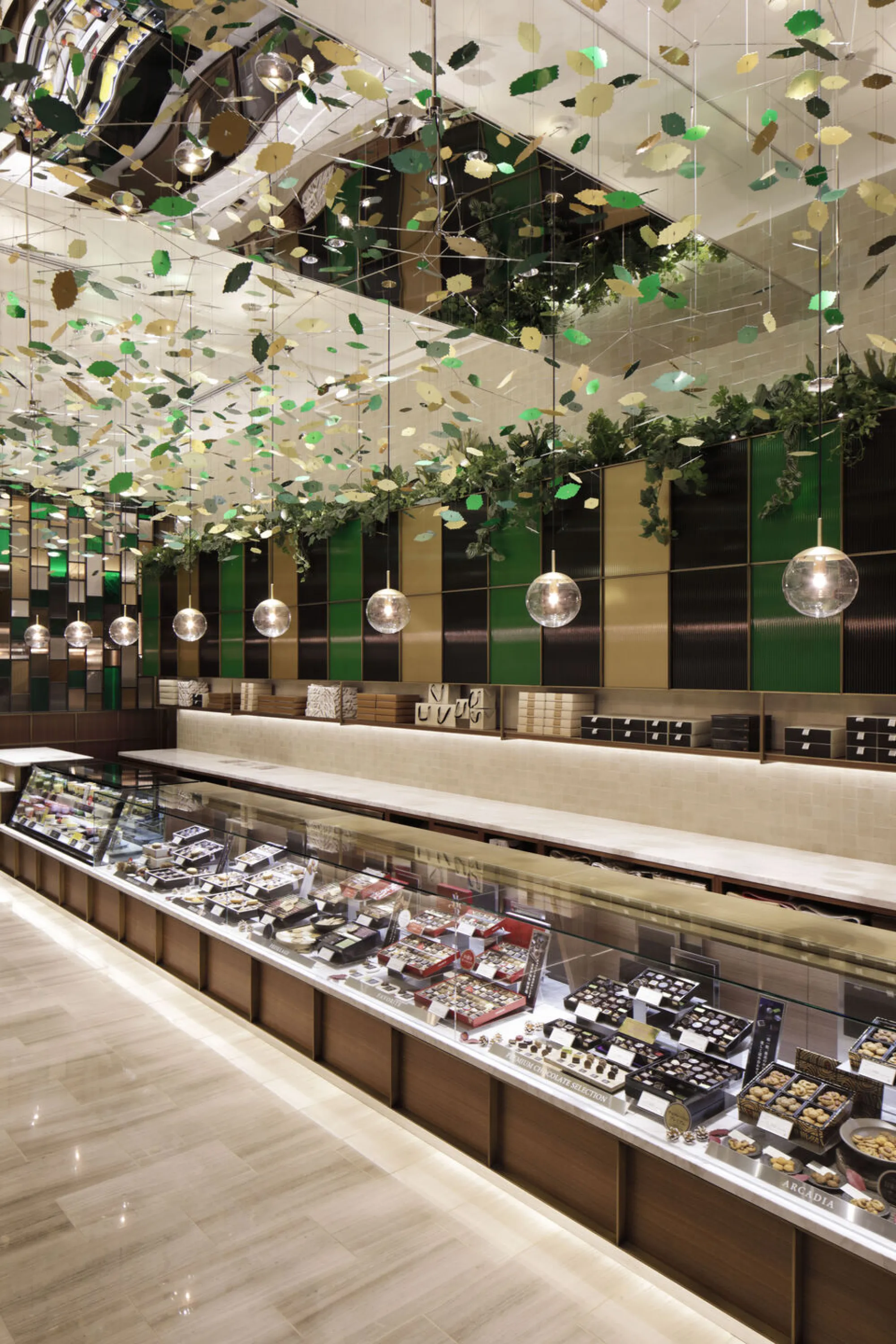 Store with leaf-shaped decorations hanging from the ceiling.
