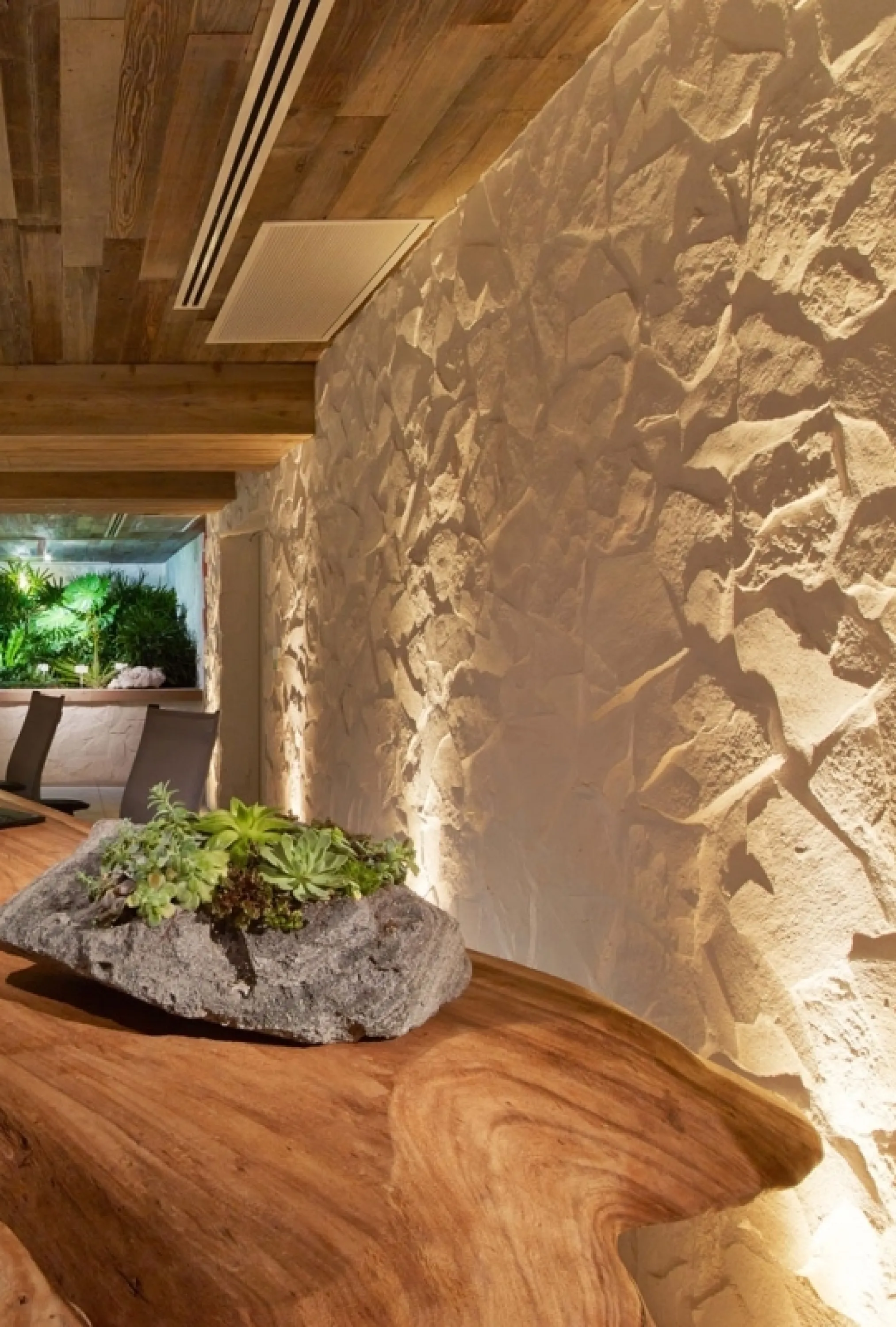 Textured wall emphasized with light.