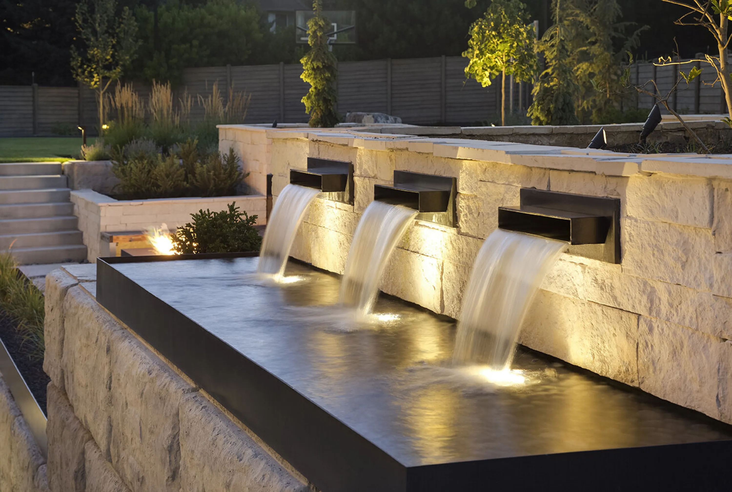 Water feature hit by light.