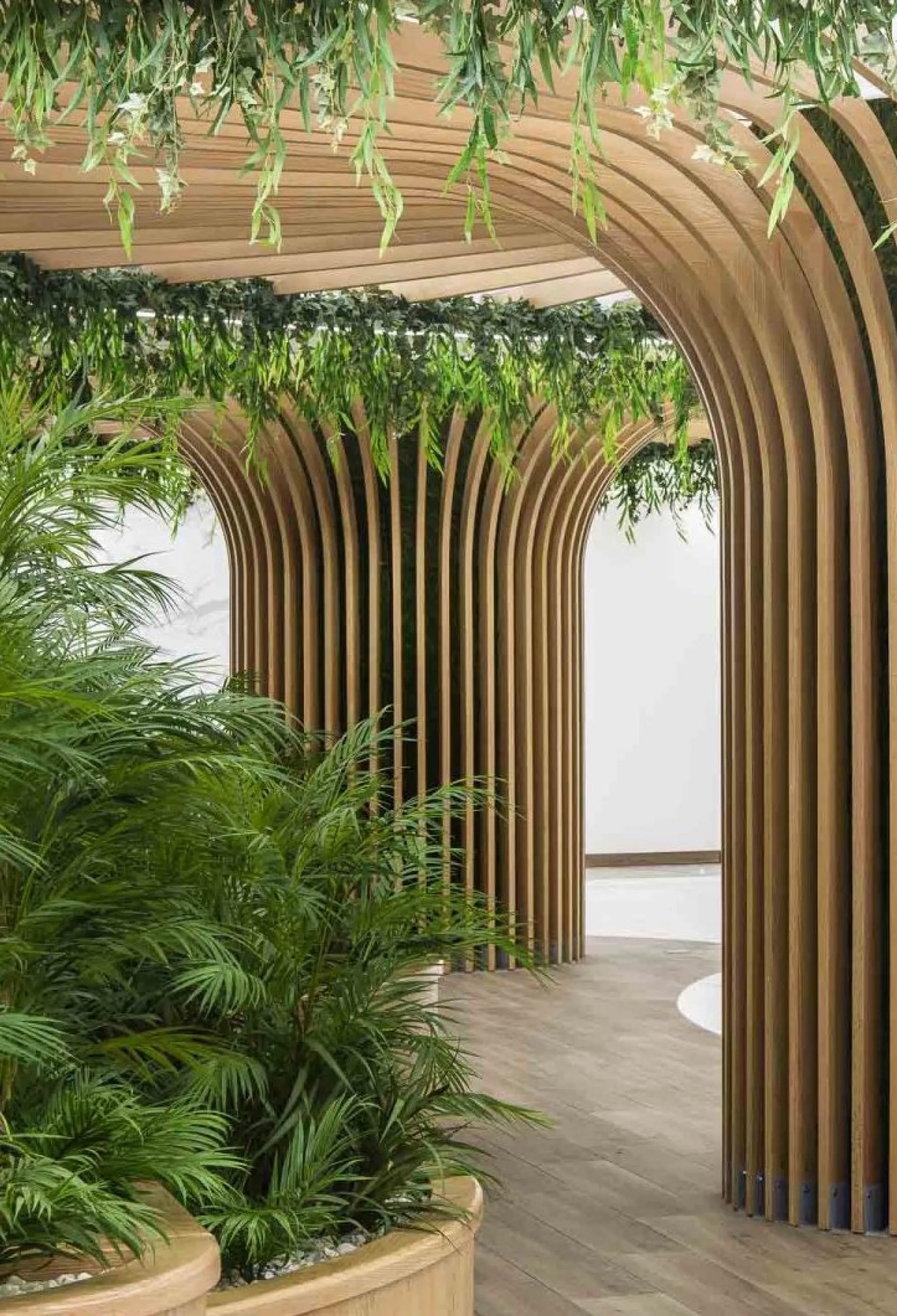 Tree-shaped column conveying a sense of growth.
