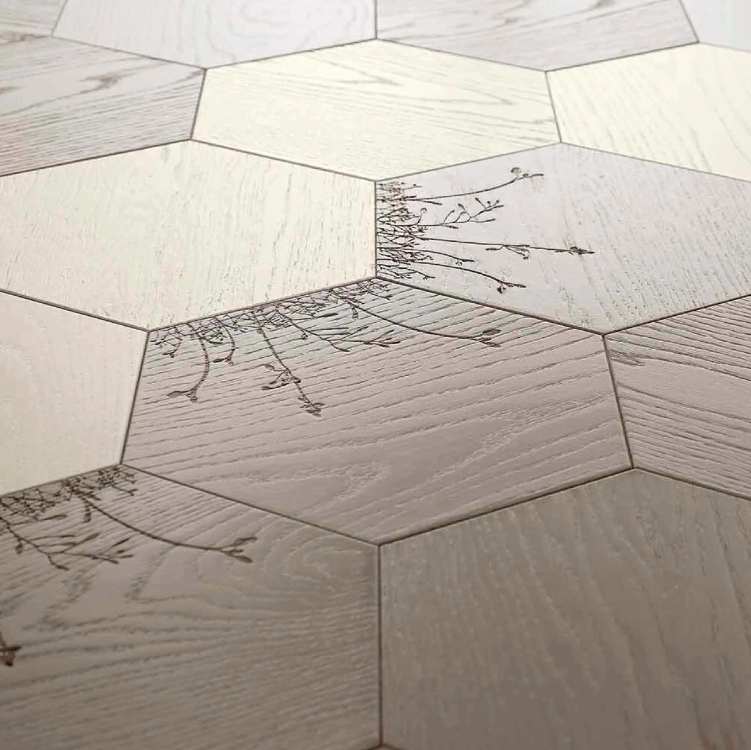 Biophilic wood floor, with carved flowers.