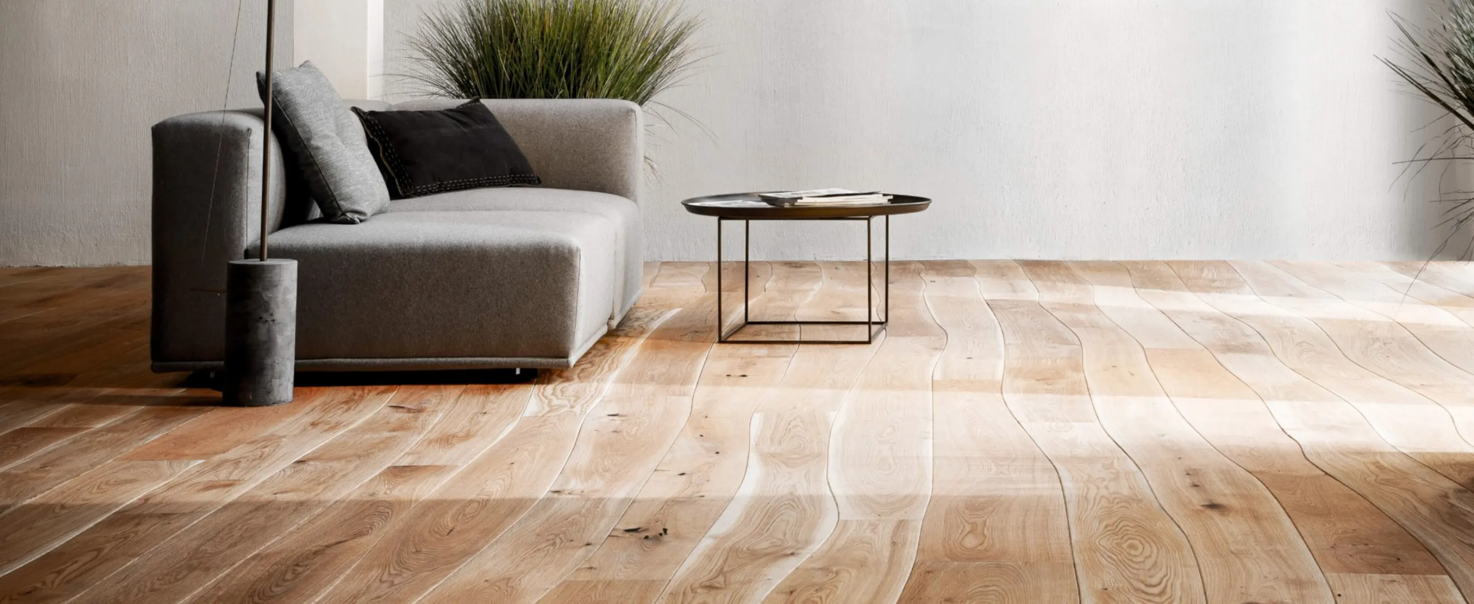 Curved wooden flooring, a great option for a biophilic design.