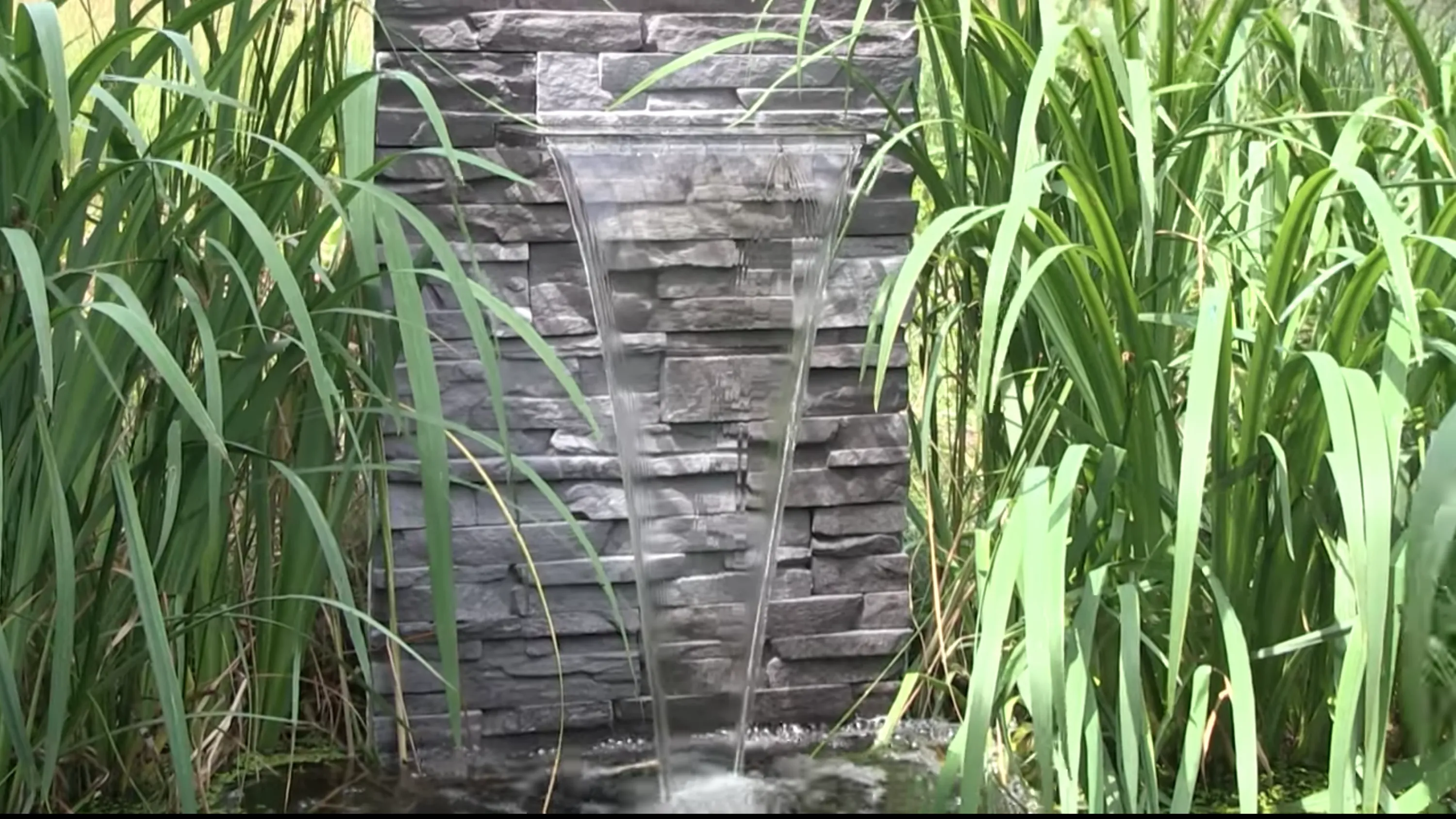 Wall water fountain, great and easy example of biophilic design.