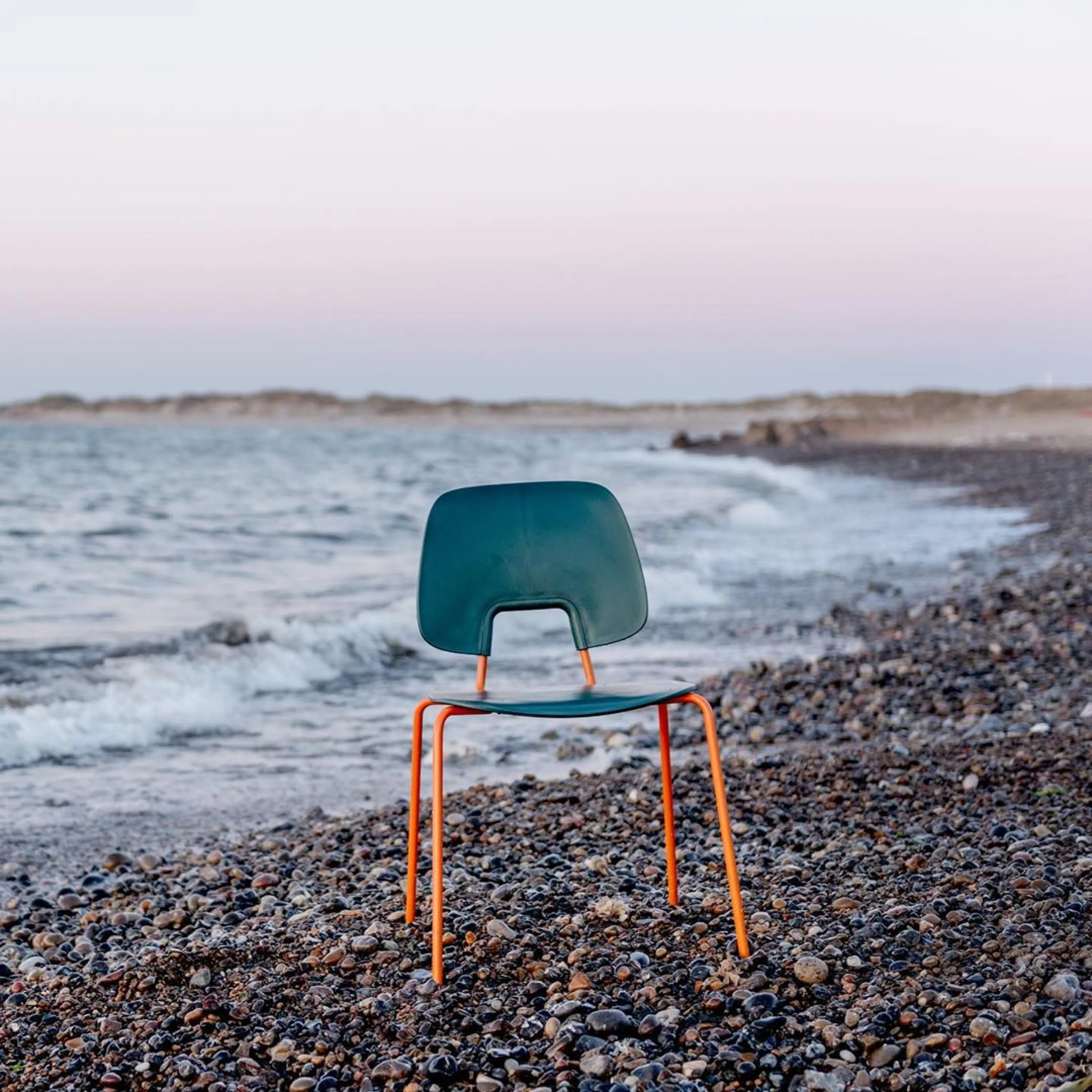 Chair made with fishing net and recycled steel.