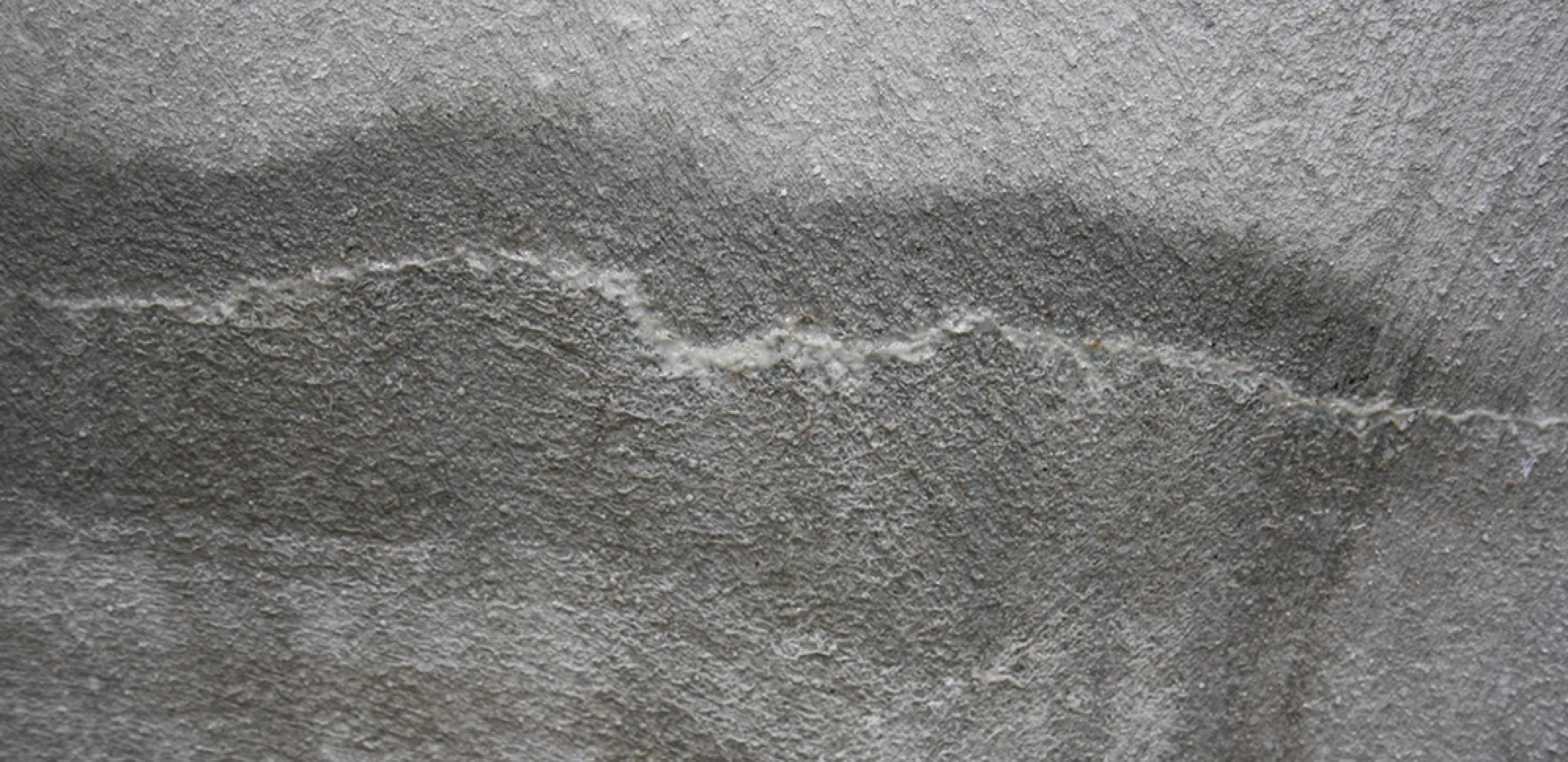 Close-up of the scar left on the concrete surface once self-healing has been completed.