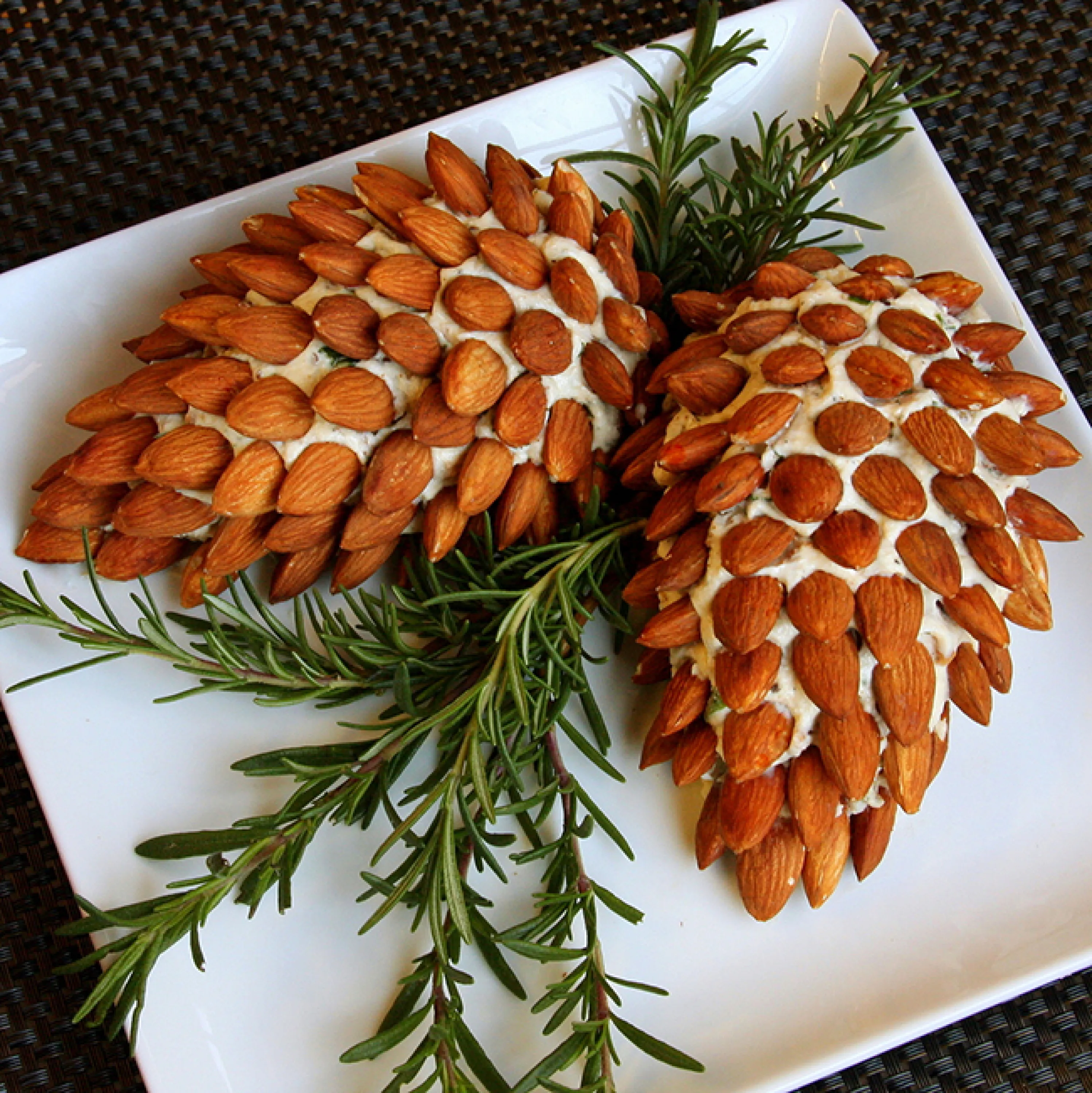 Cheese mousse covered with almonds to reseamble a pinecone.