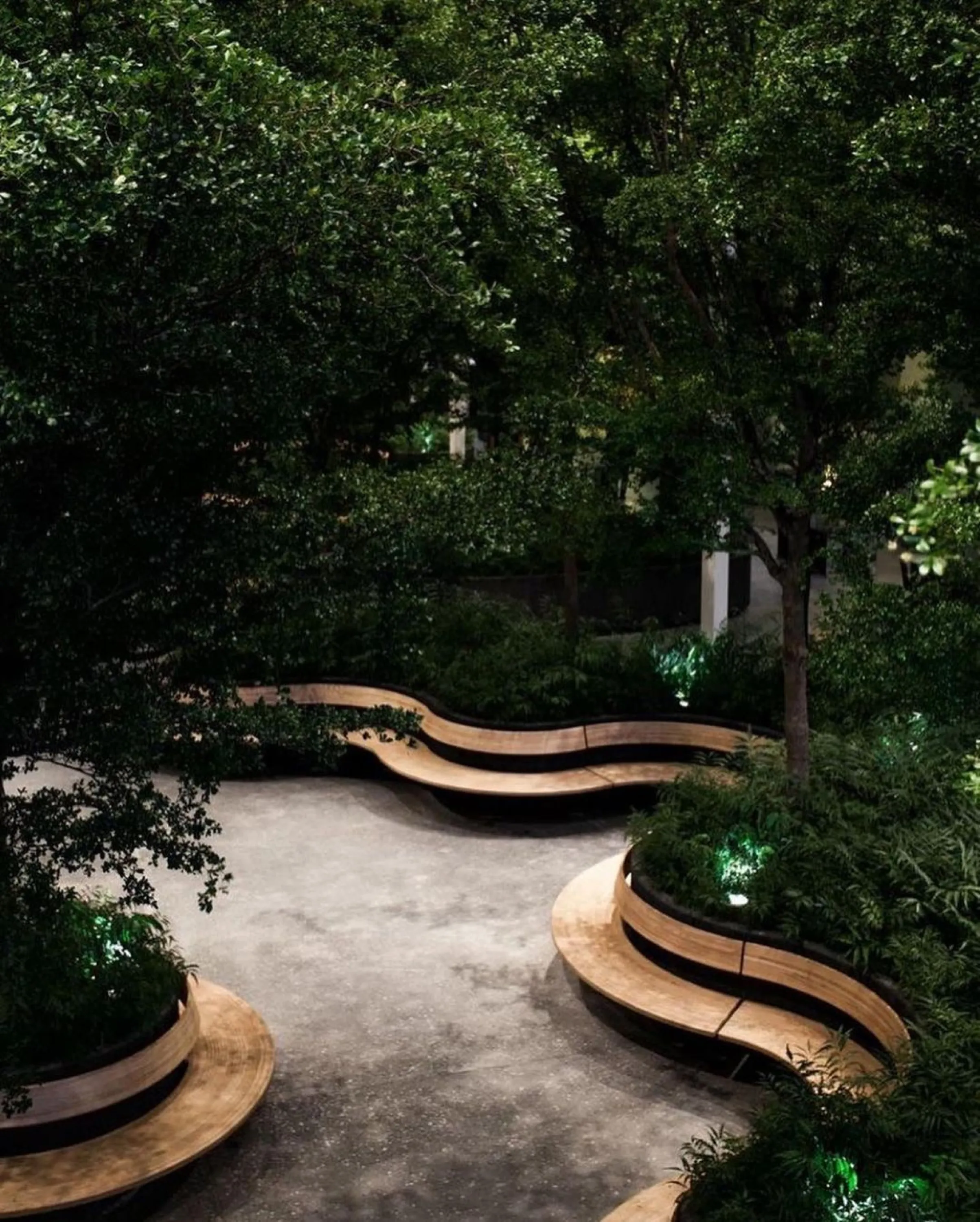 Communal area with rounded benches creating individual refuge areas.