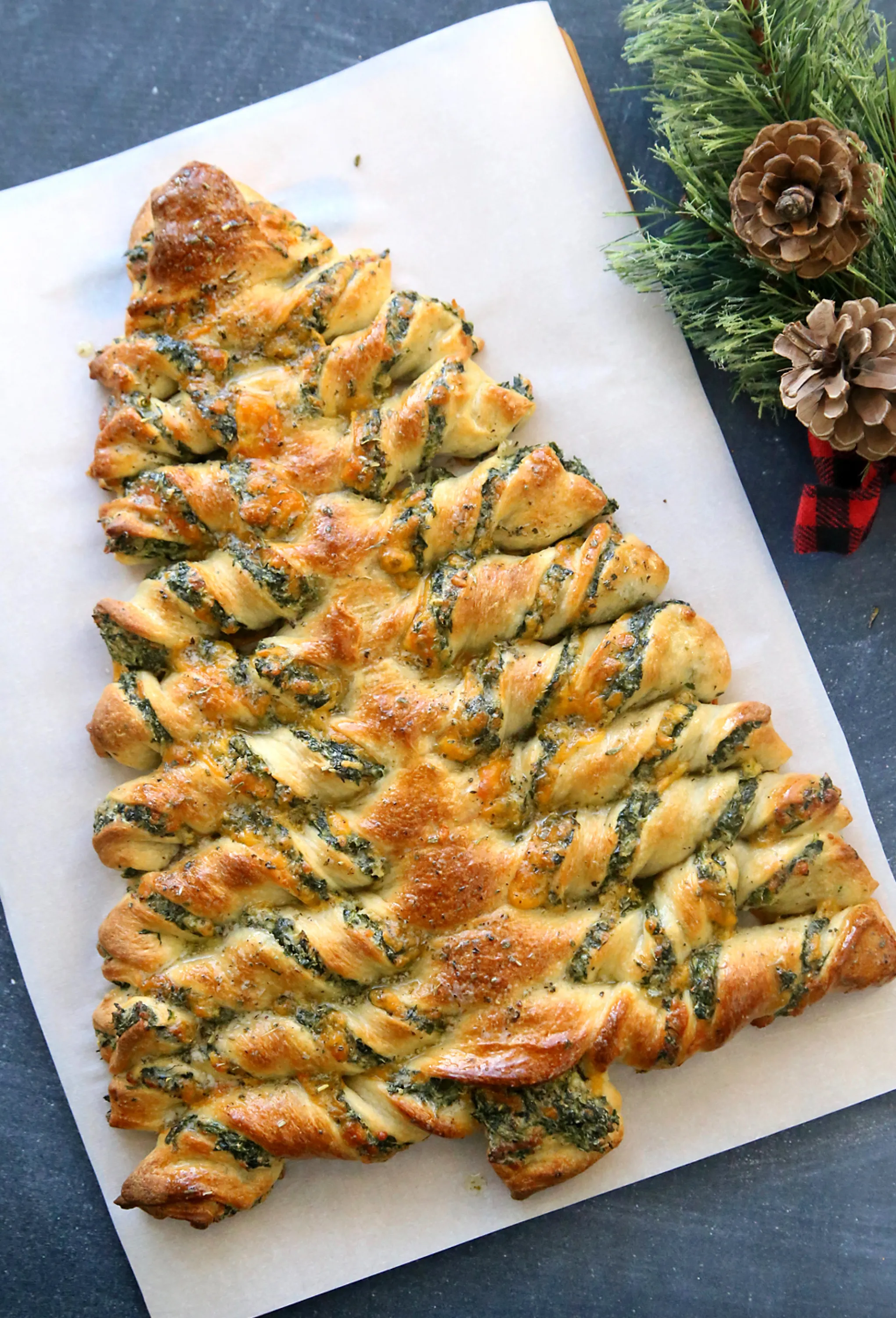Spinach bread in the shape of a Christmas tree.